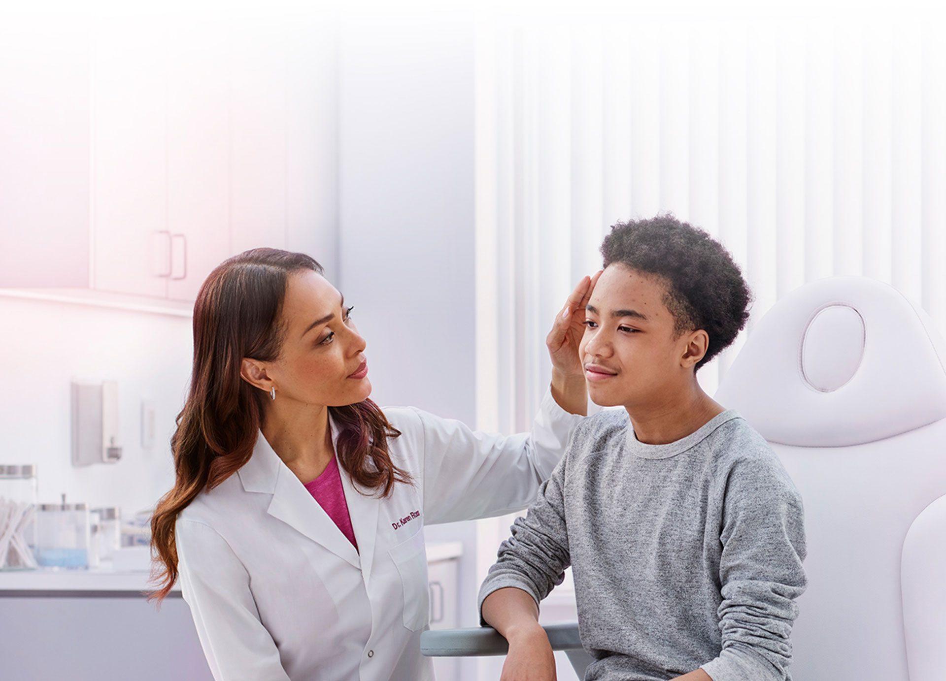 A young man being examined by a doctor